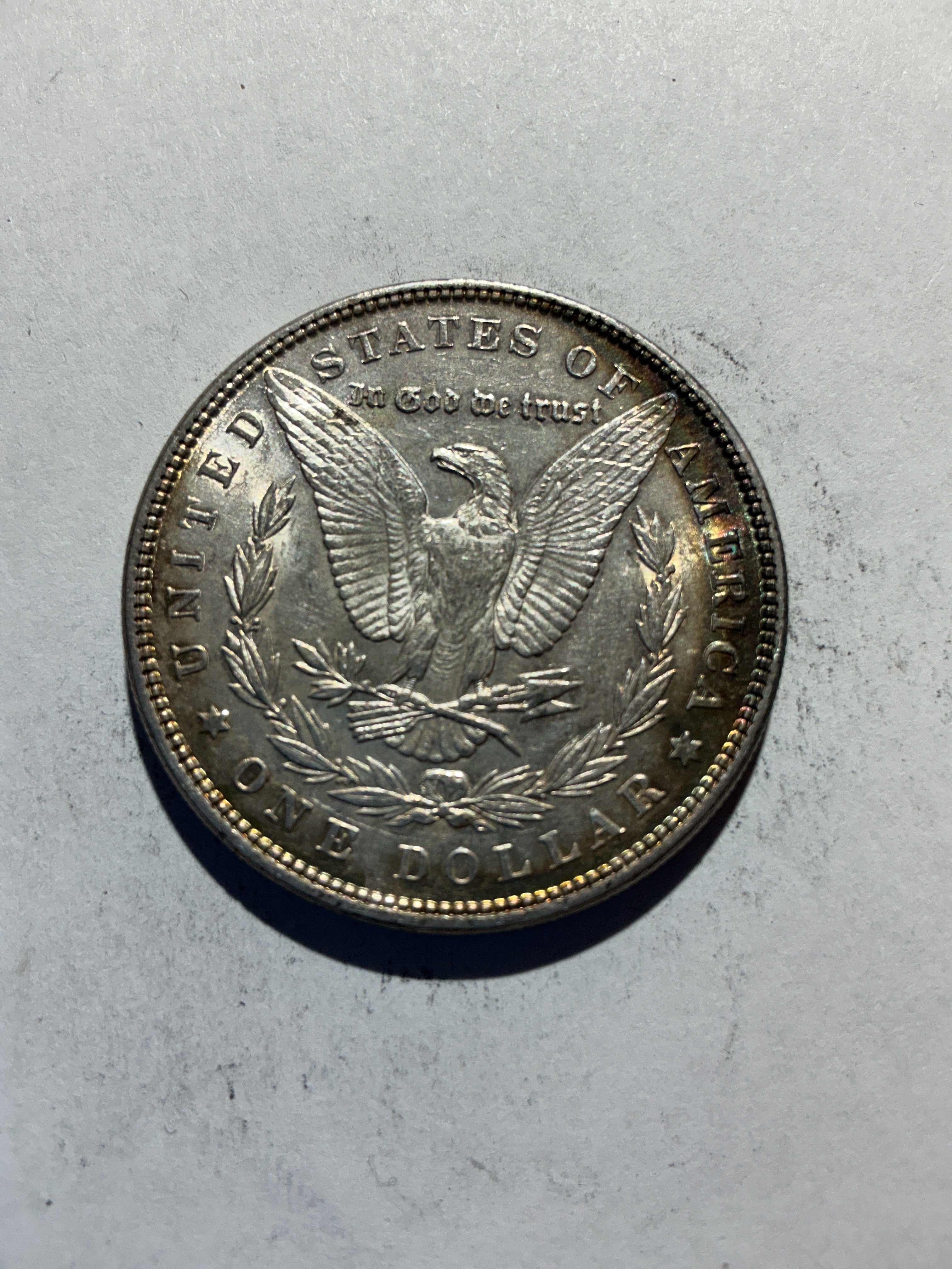 Lot 60, 1886 Morgan silver dollar, AU