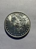 Lot 31, 1900 O Morgan silver dollar, BU