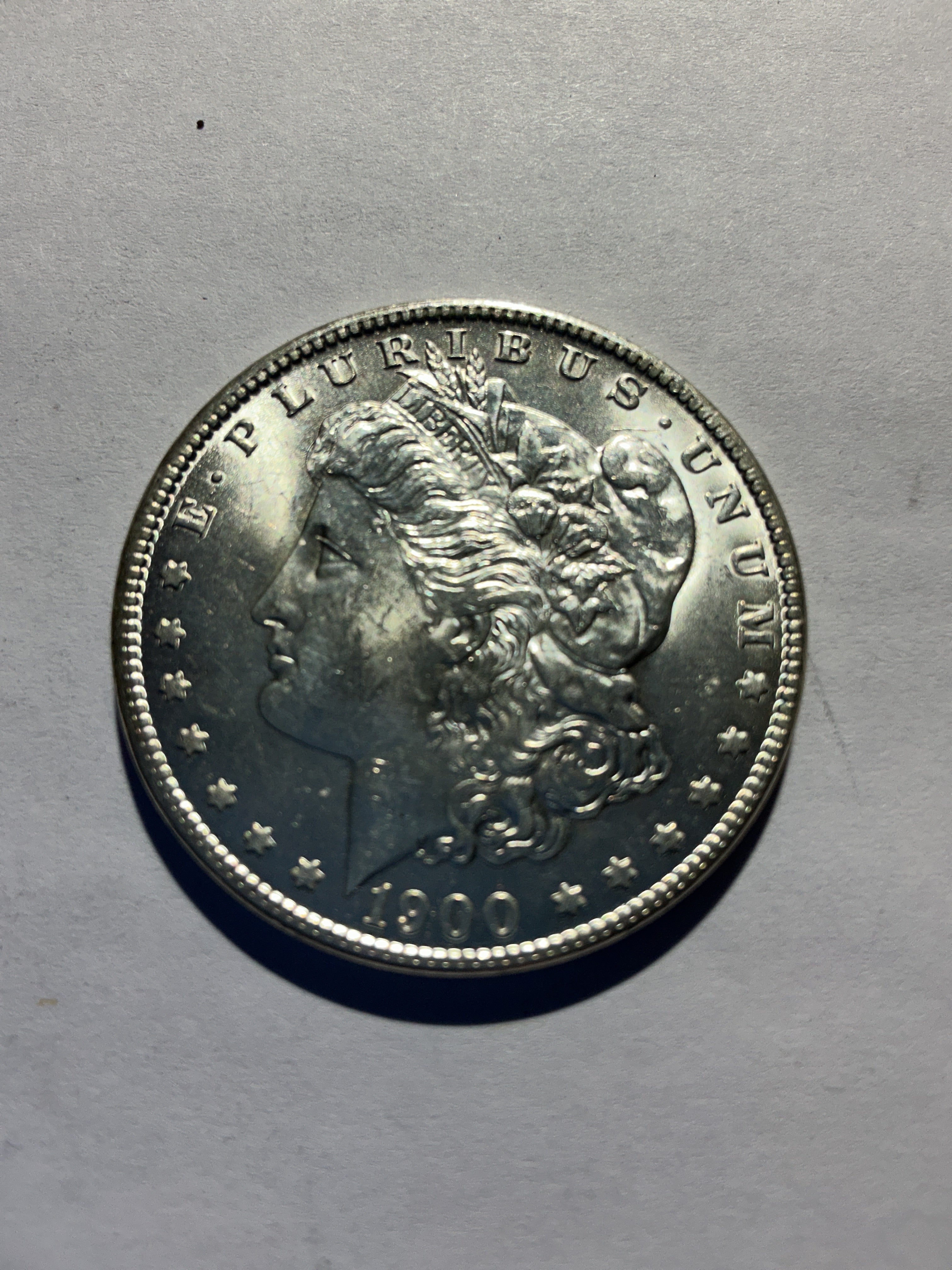 Lot 31, 1900 O Morgan silver dollar, BU