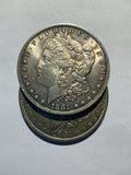 Lot 6, 2, 1881 Morgan silver dollar, AU