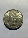 Lot 53, 1889 Morgan silver dollar, AU