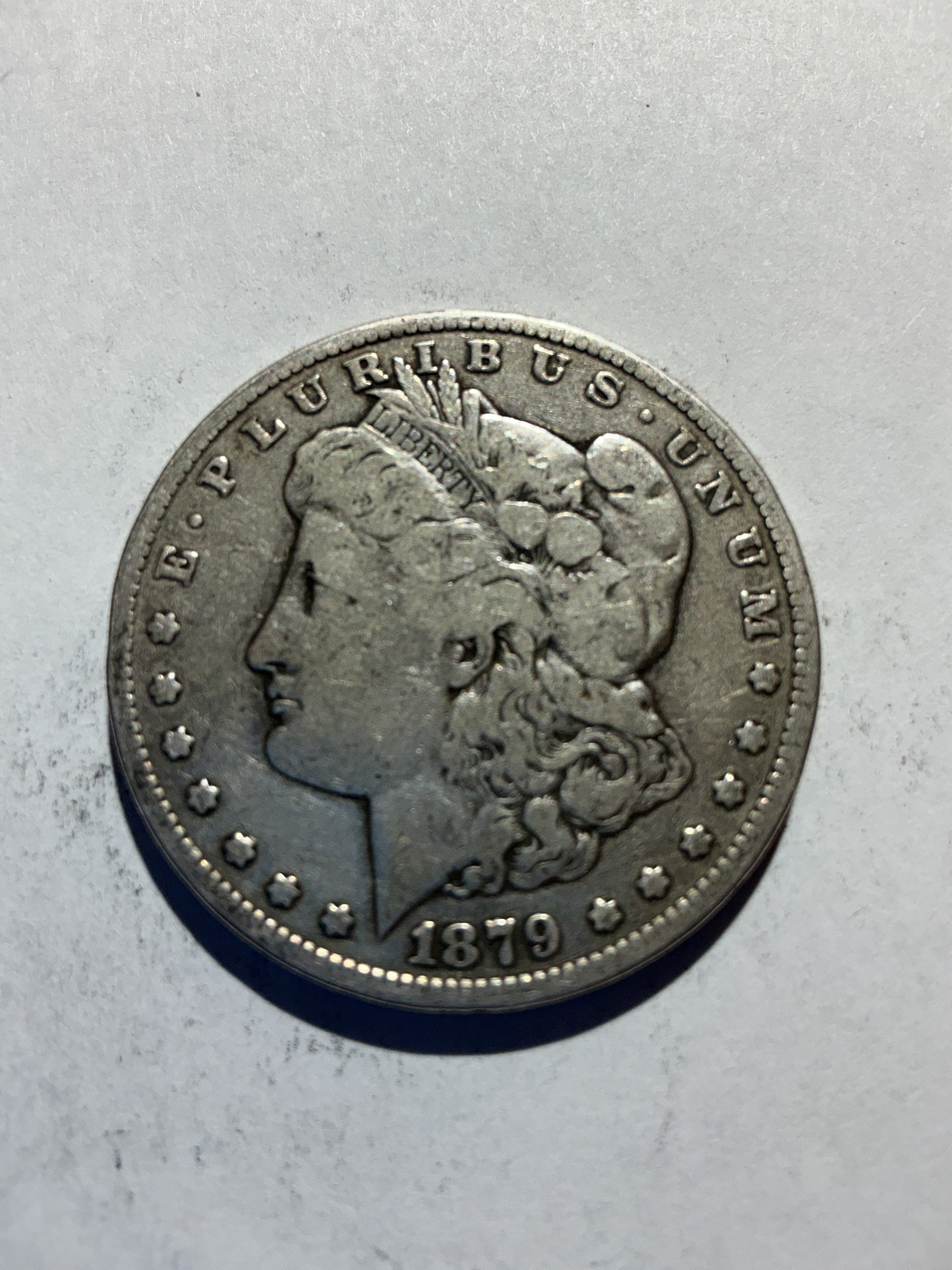 Lot 55, 1879 S Morgan silver dollar, AU