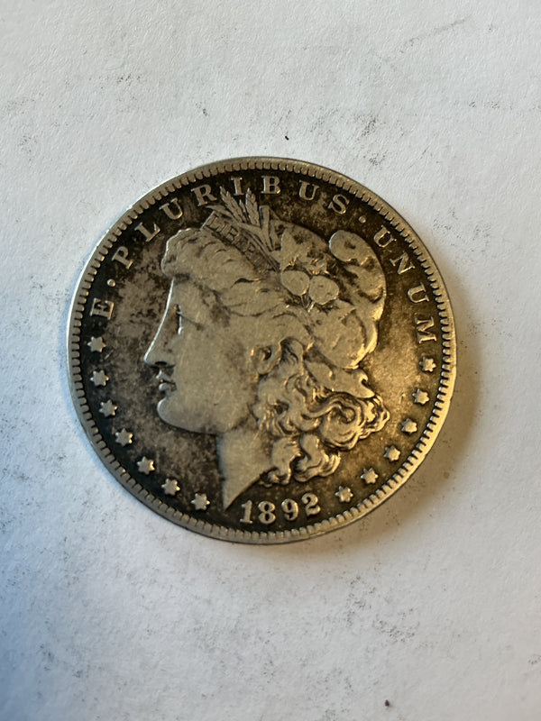 Lot 32, 1892 O Morgan silver dollar, VG