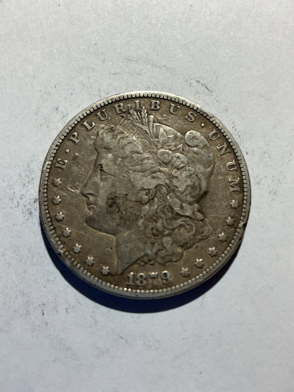 Lot 56, 1879 S Morgan silver dollar,
