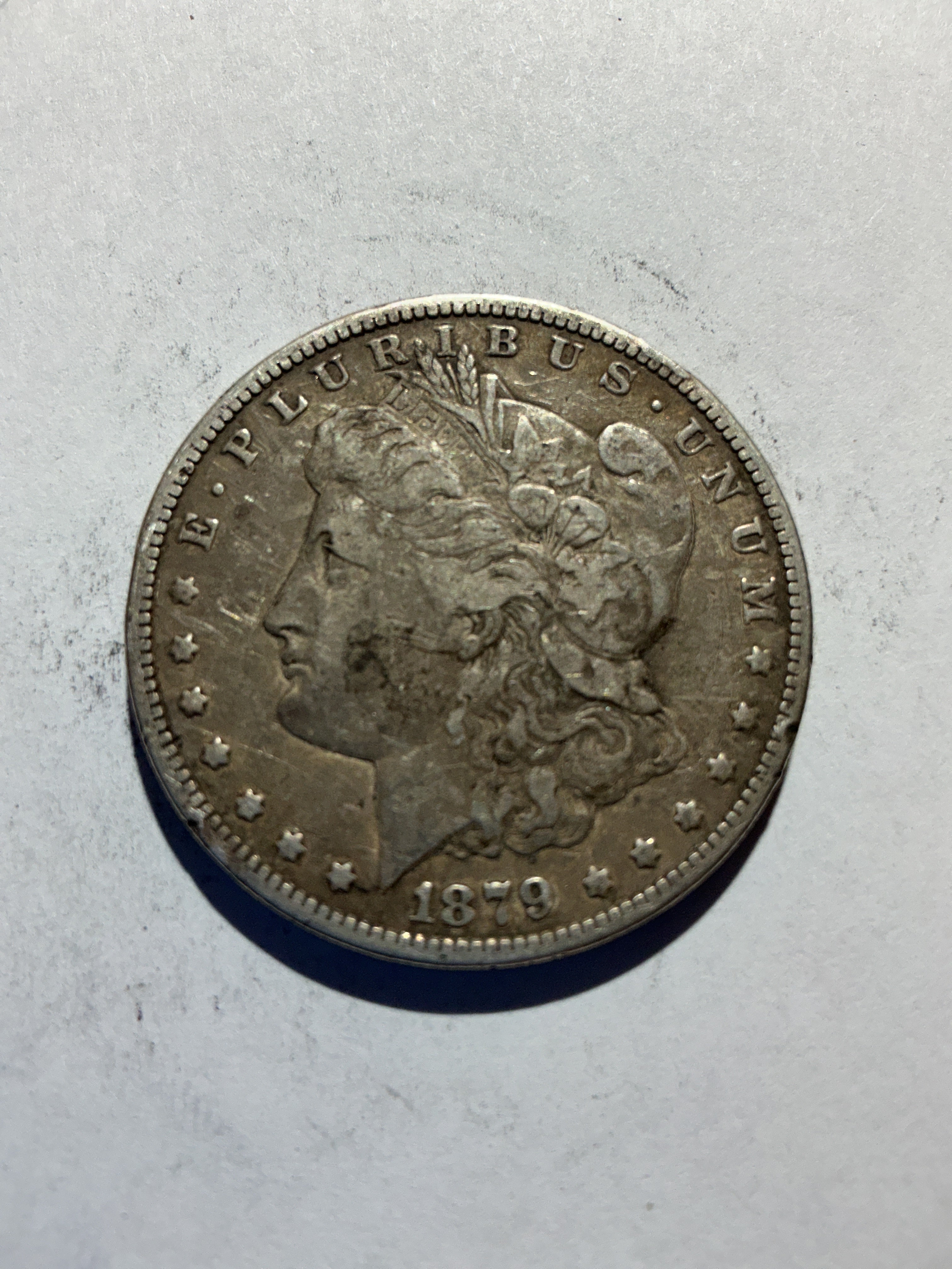 Lot 56, 1879 S Morgan silver dollar,