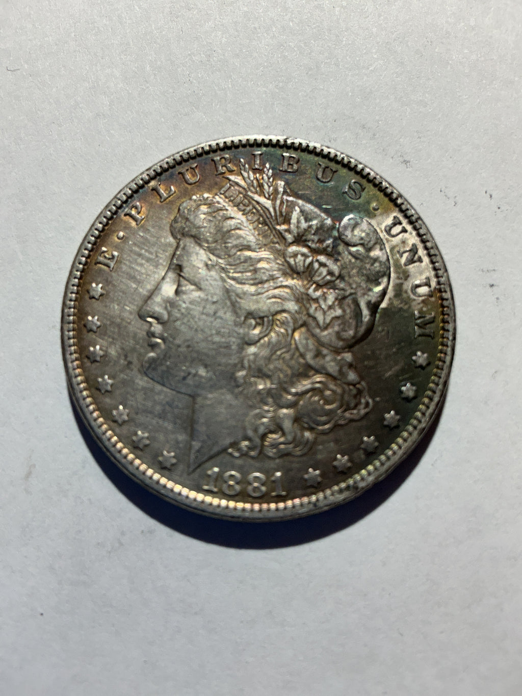 Lot 27, 1881 Morgan silver dollar, AU