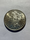 Lot 58, 1891 S Morgan silver dollar, AU