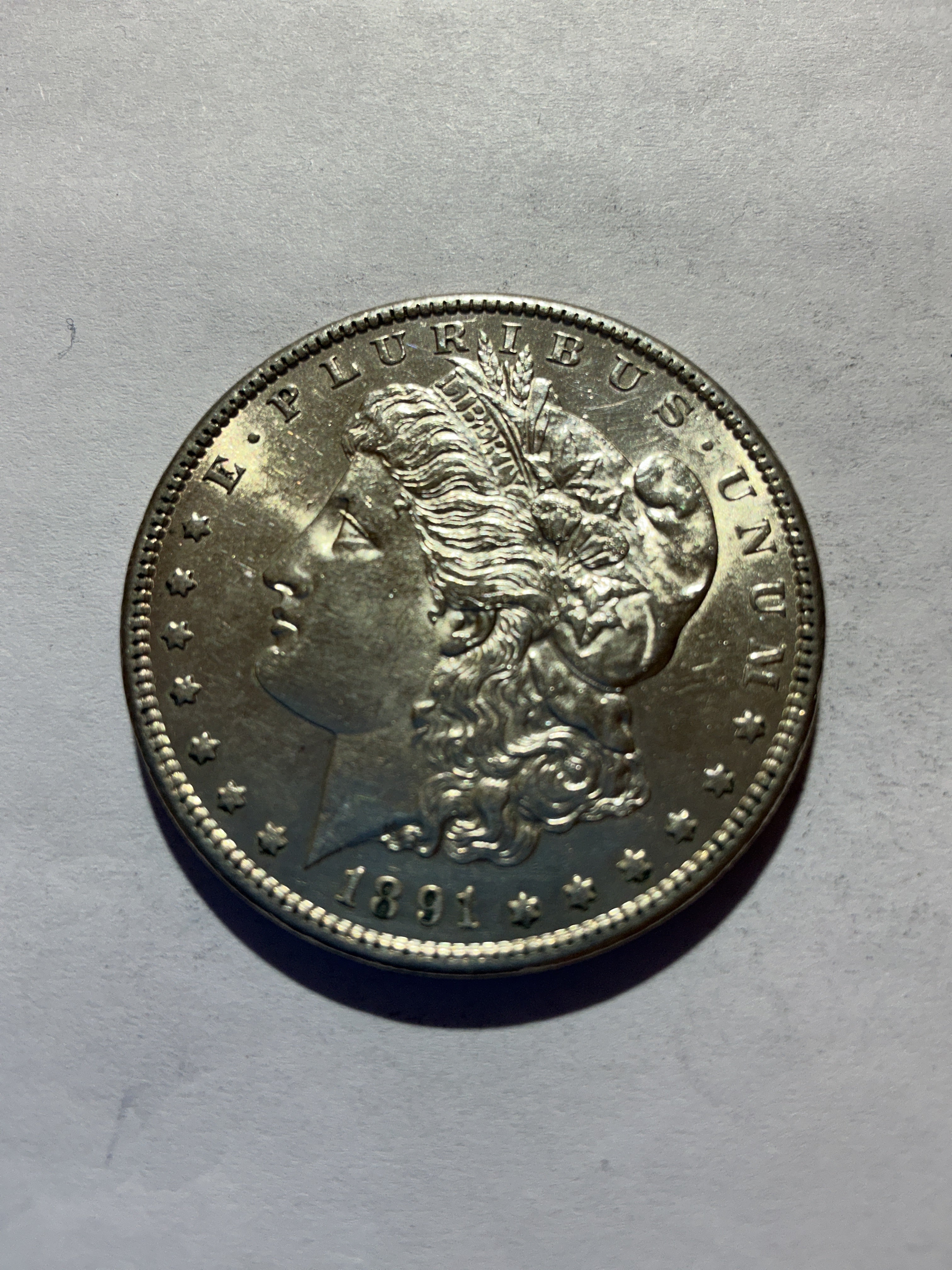Lot 58, 1891 S Morgan silver dollar, AU