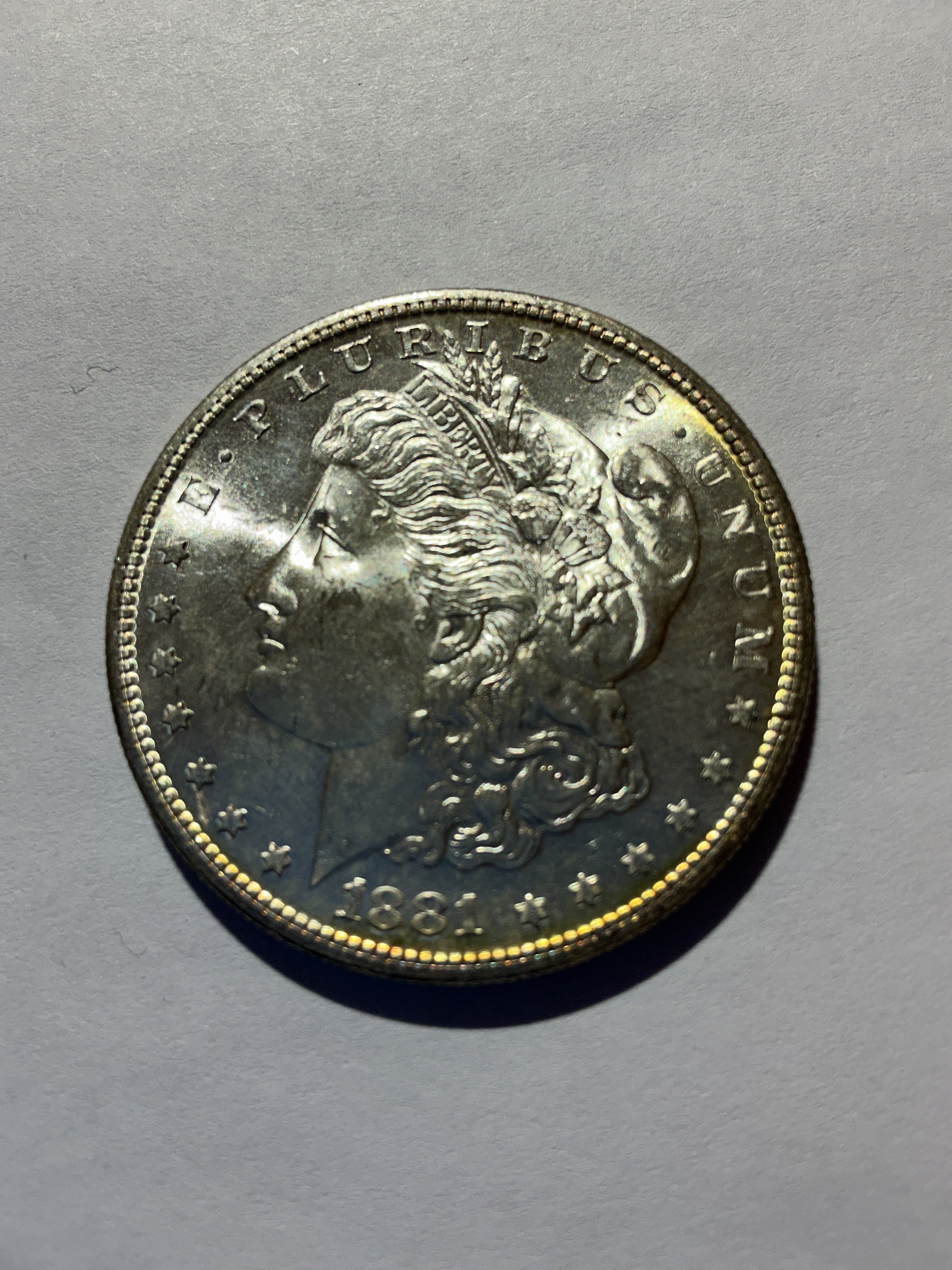 Lot 67, 1881 S Morgan silver dollar, Bu