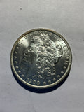 Lot 34, 1900 O Morgan silver dollar, BU