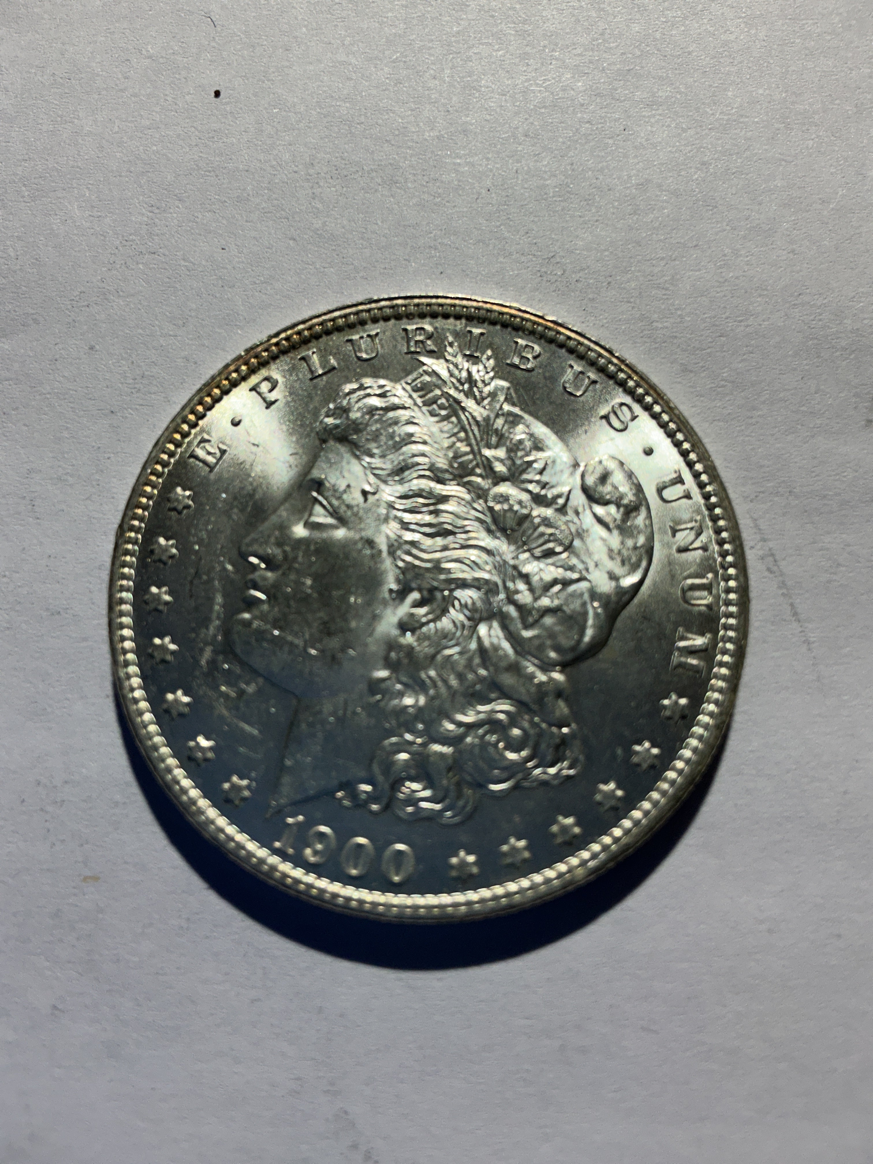 Lot 34, 1900 O Morgan silver dollar, BU