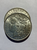 Lot 9, 2, 1891 Morgan silver dollar, AU