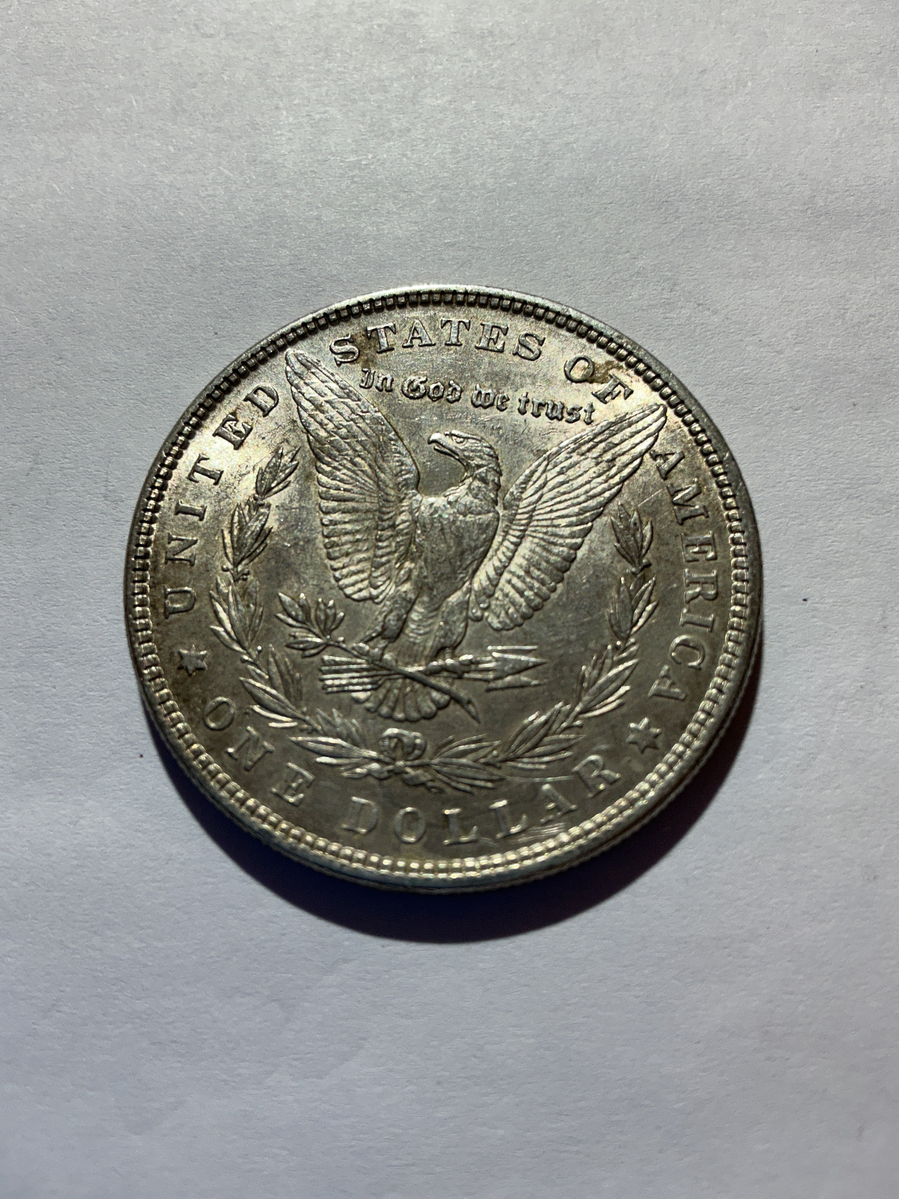 Lot 38, 1880 Morgan silver dollar, AU