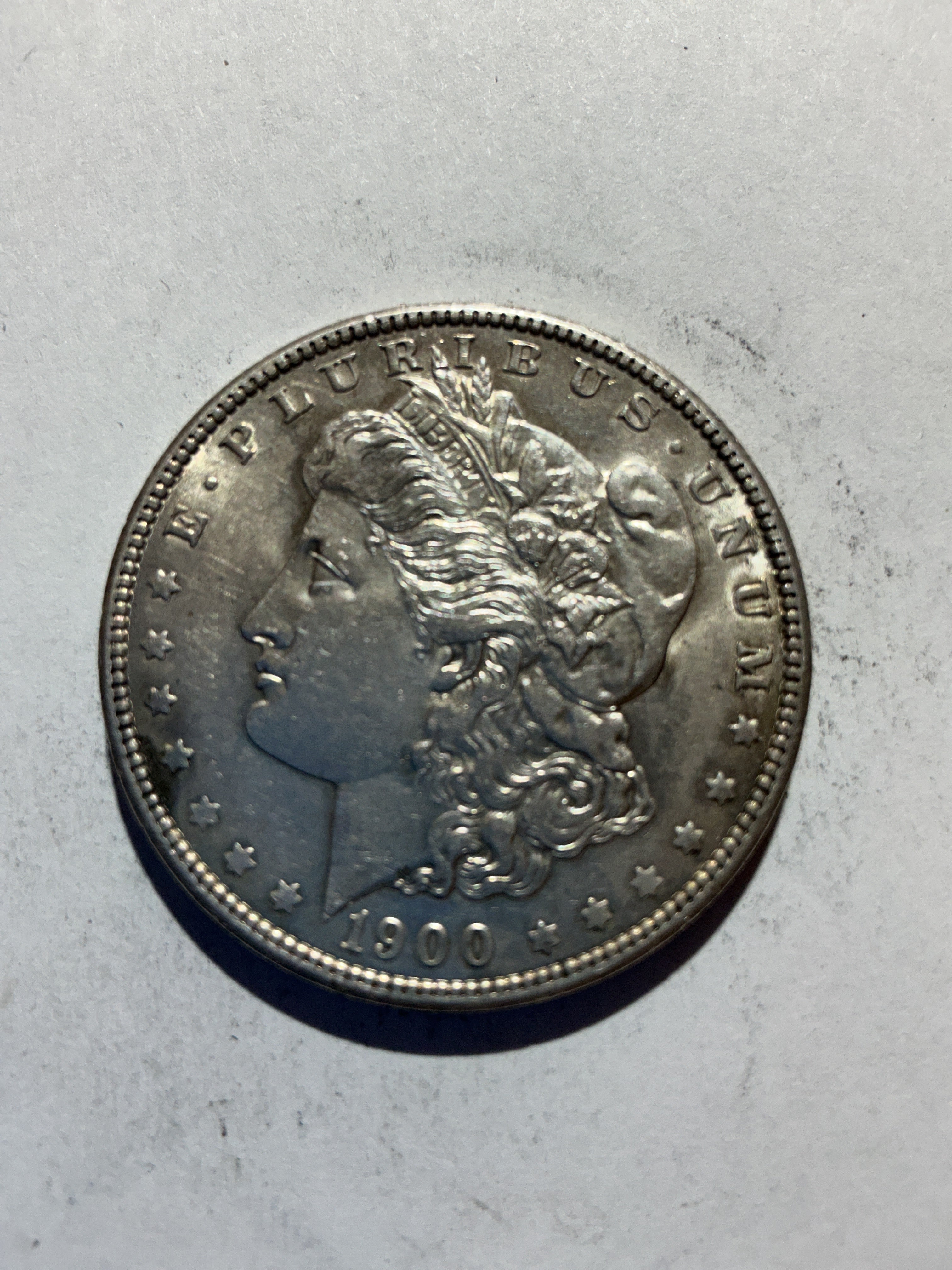 Lot 66, 1900 Morgan silver dollar, AU