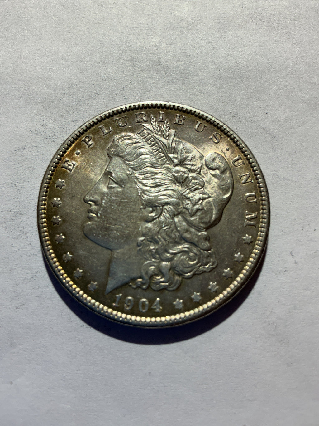 Lot 62, 1904 Morgan silver dollar, AU
