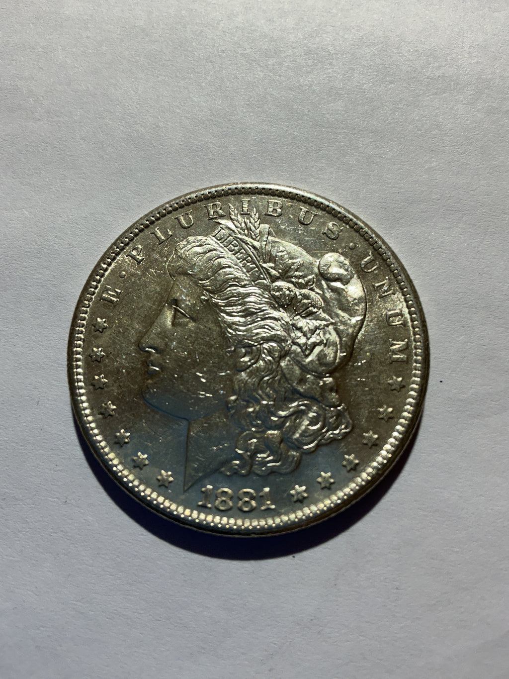 Lot 40, 1881 S Morgan silver dollar, AU