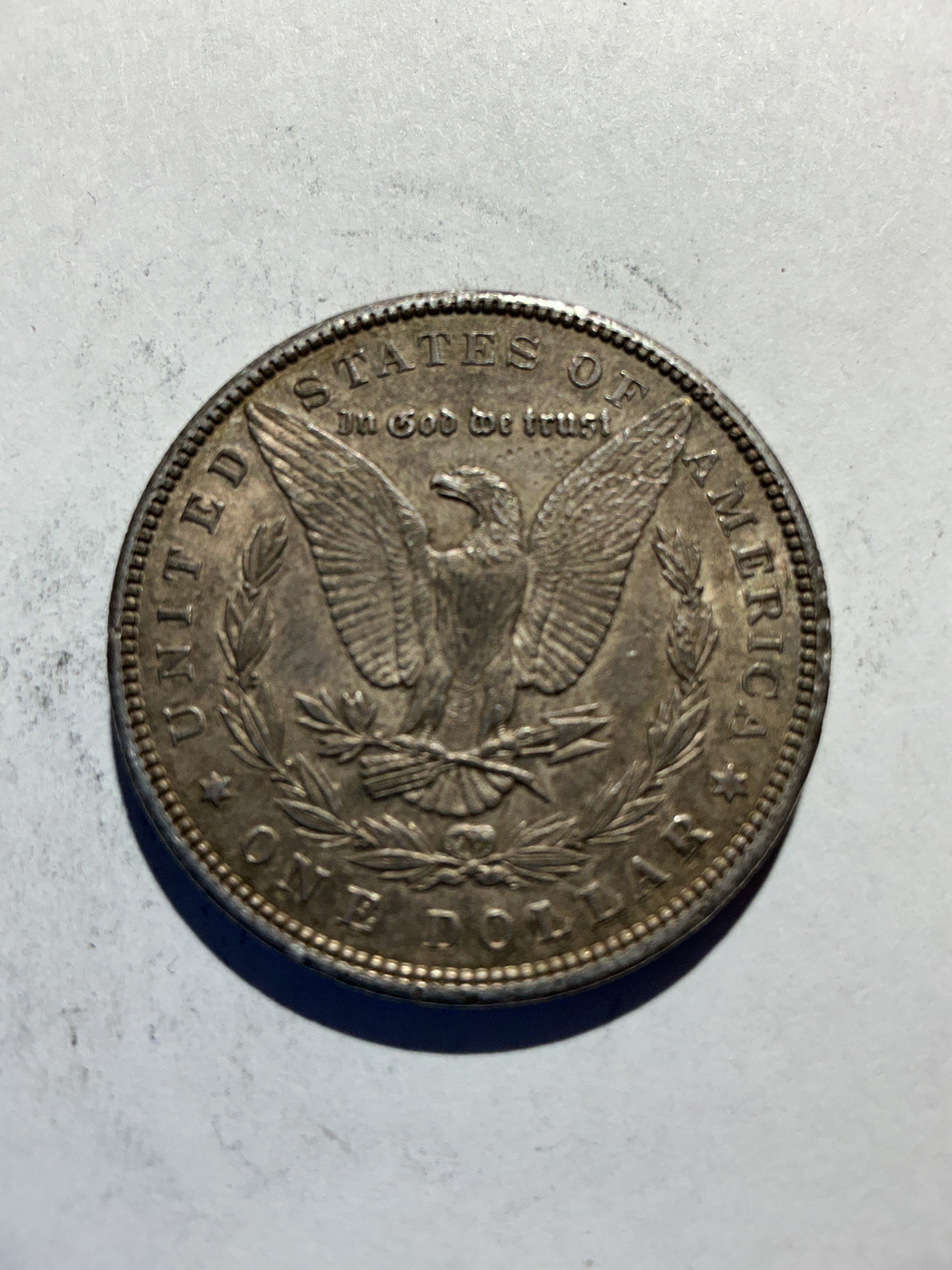 Lot 61, 1900 Morgan silver dollar, AU