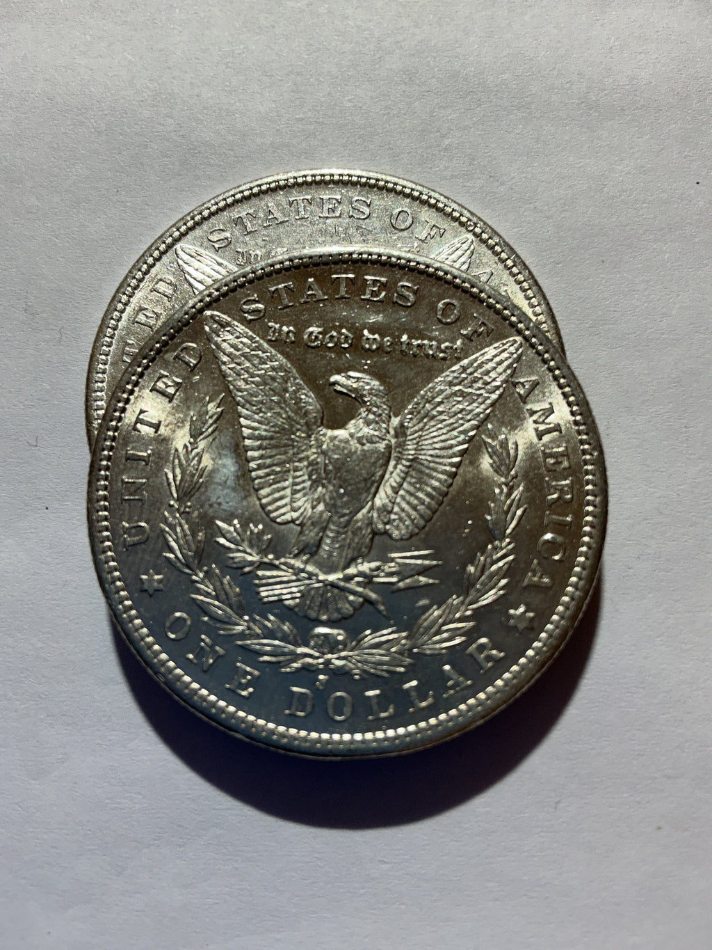 Lot 39, 2 1880 S Morgan silver dollar, AU