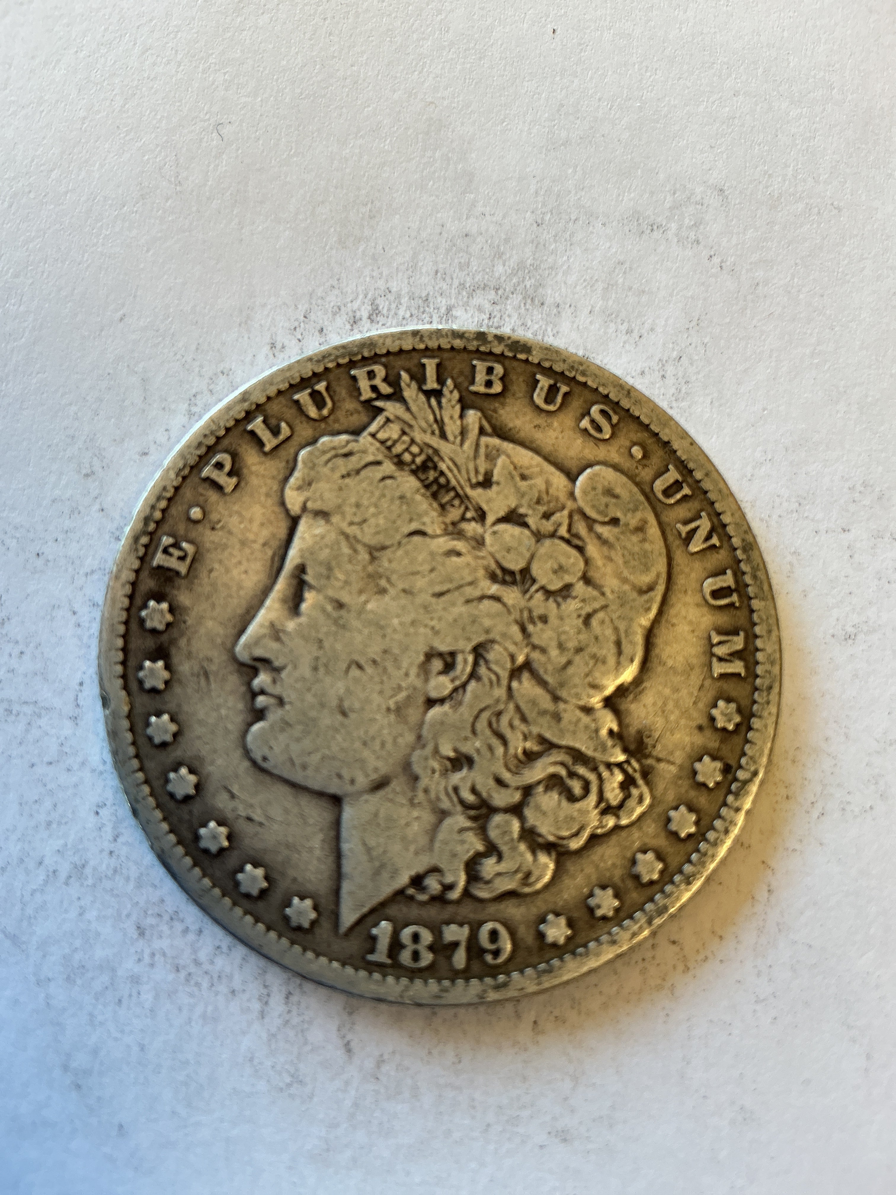 Lot 100, 1879 O Morgan silver dollar VG