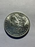 Lot 36, 1900 O Morgan silver dollar, BU