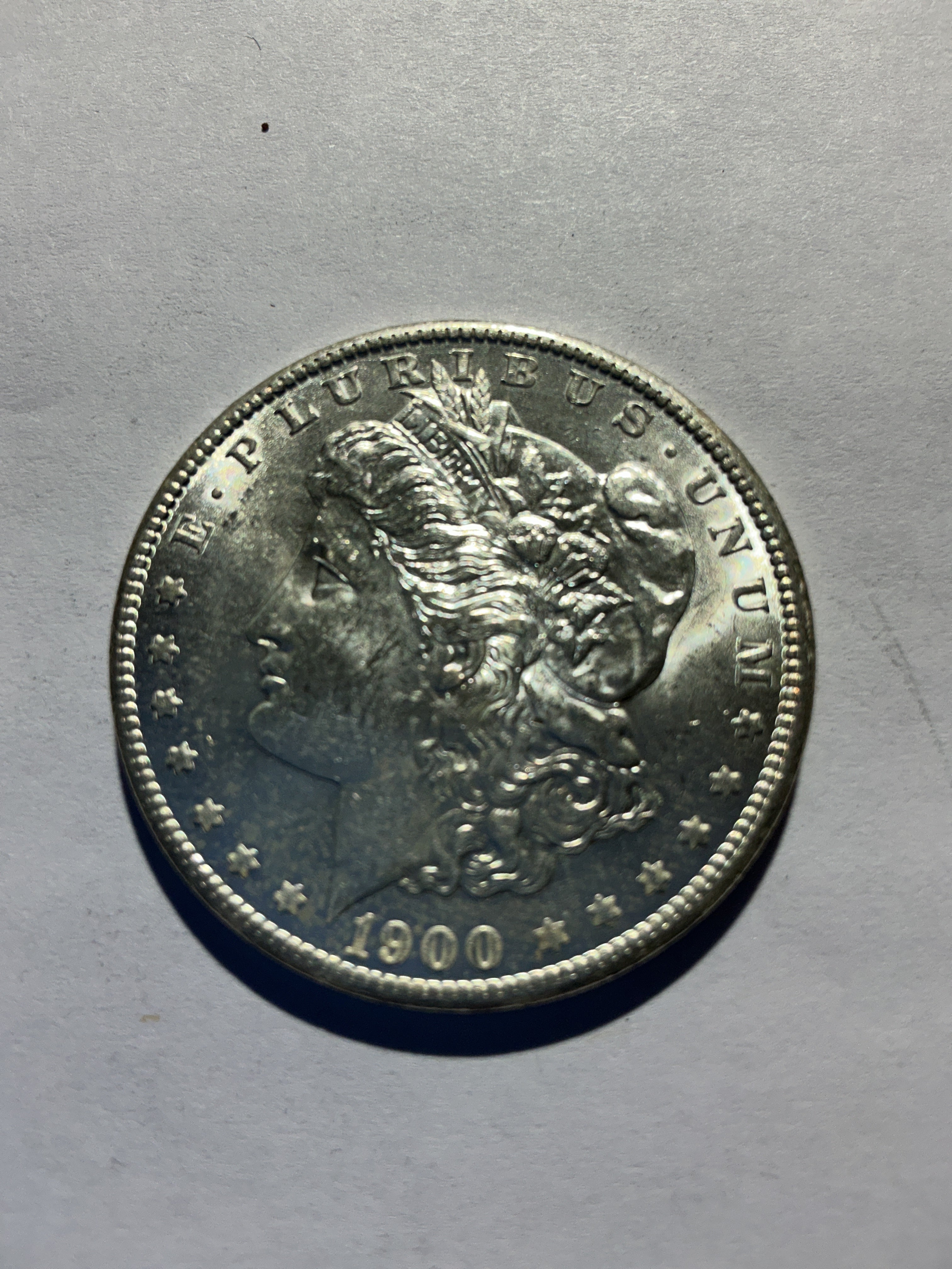 Lot 36, 1900 O Morgan silver dollar, BU