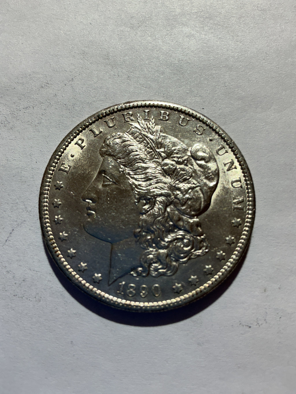 Lot 57, 1890 S Morgan silver dollar, AU