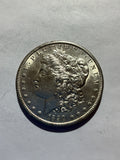 Lot 57, 1890 S Morgan silver dollar, AU
