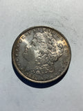 Lot 46, 1884 O Morgan silver dollar, AU