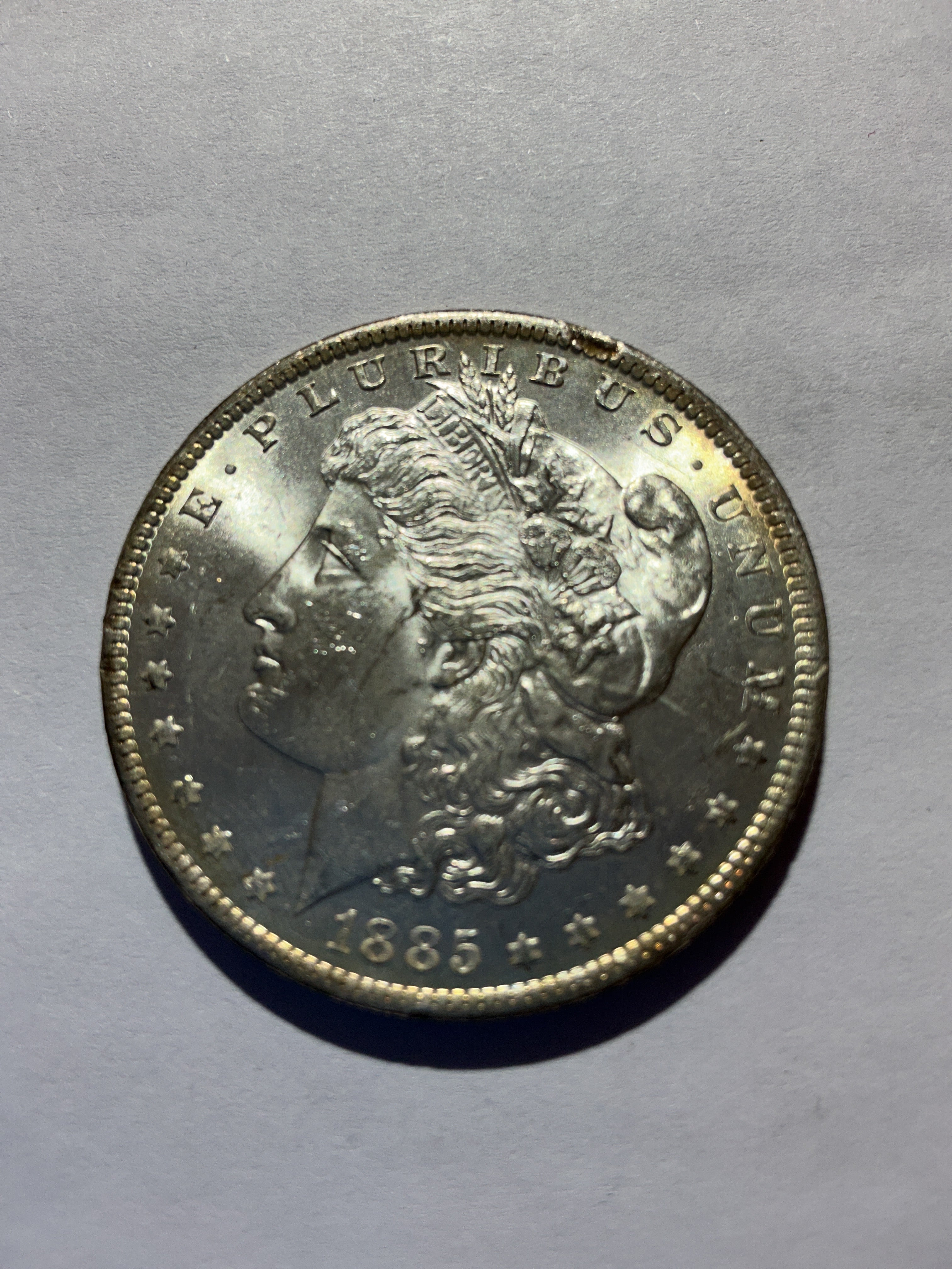 Lot 70, 1885 O Morgan silver dollar, BU