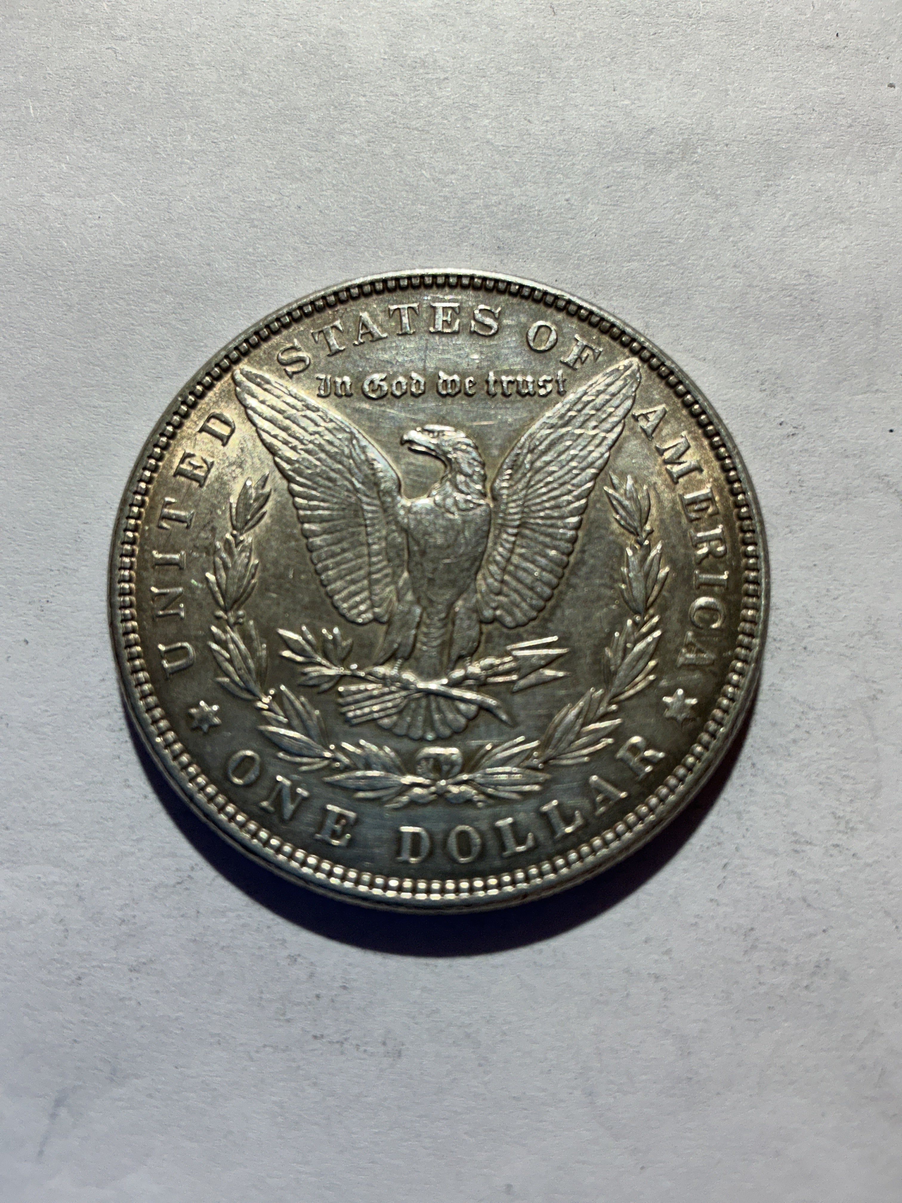 Lot 52, 1886 Morgan silver dollar, AU