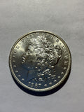 Lot 73, 1887 O Morgan silver dollar, BU