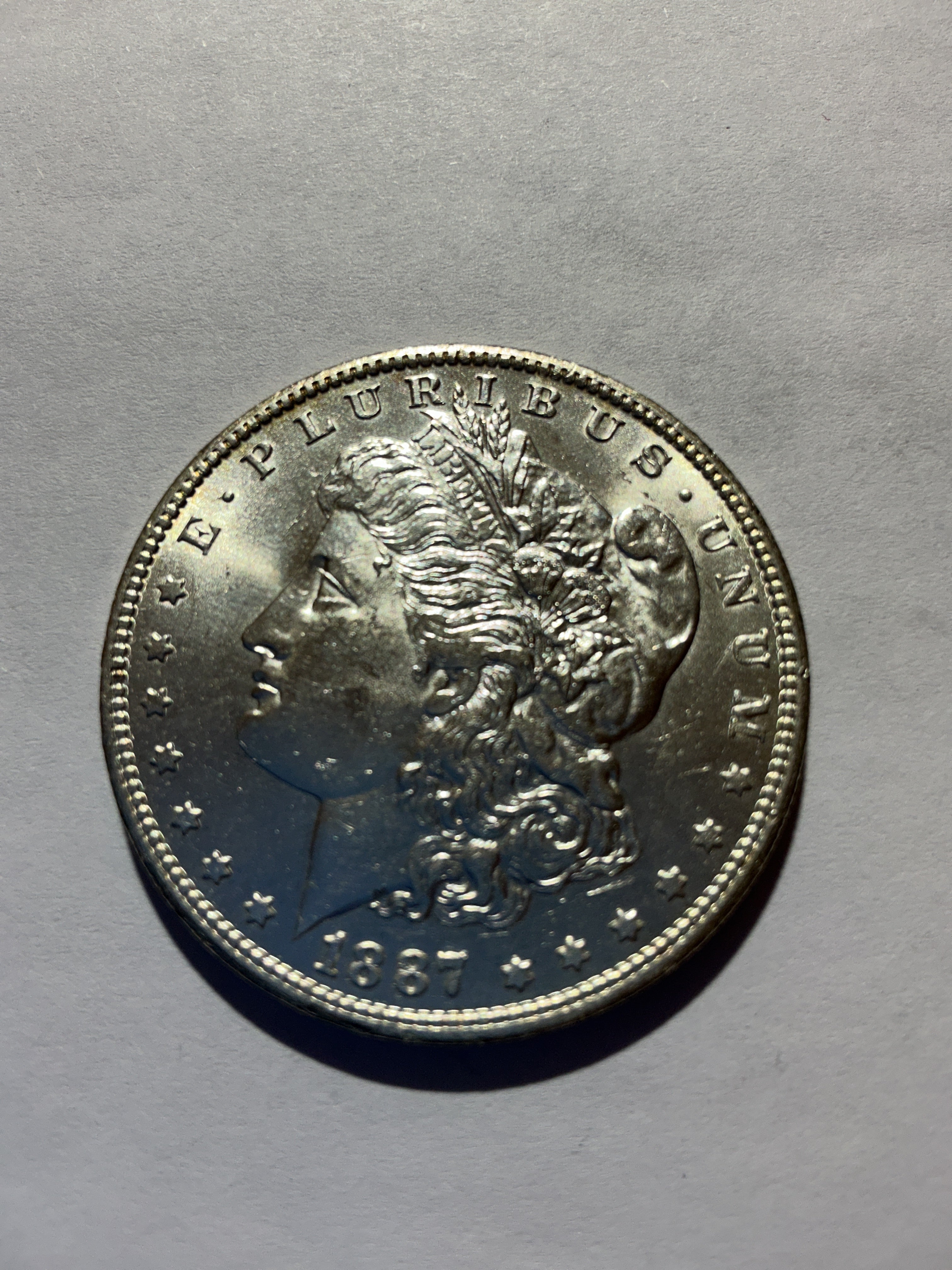 Lot 73, 1887 O Morgan silver dollar, BU