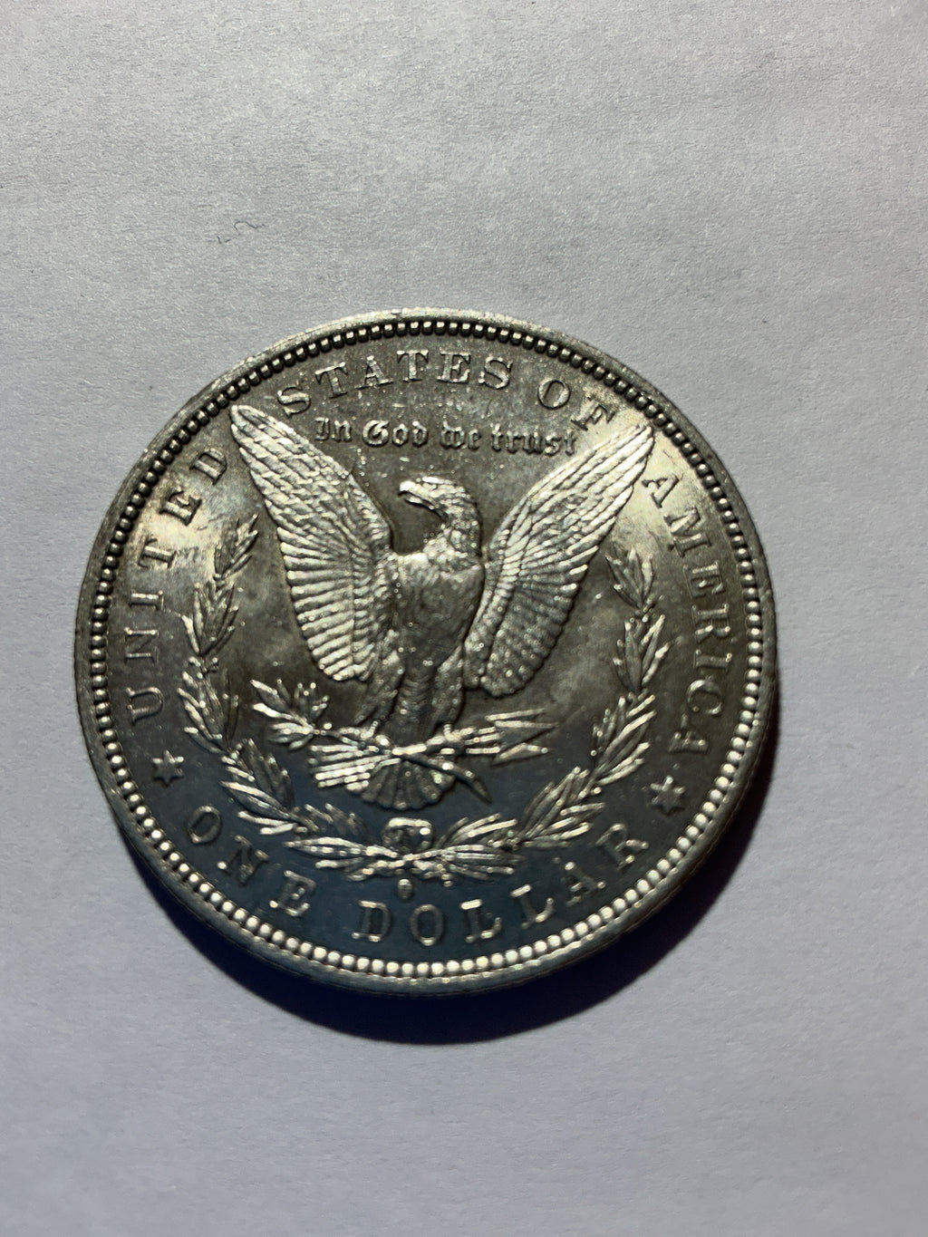 Lot 69, 1884 O Morgan silver dollar, BU