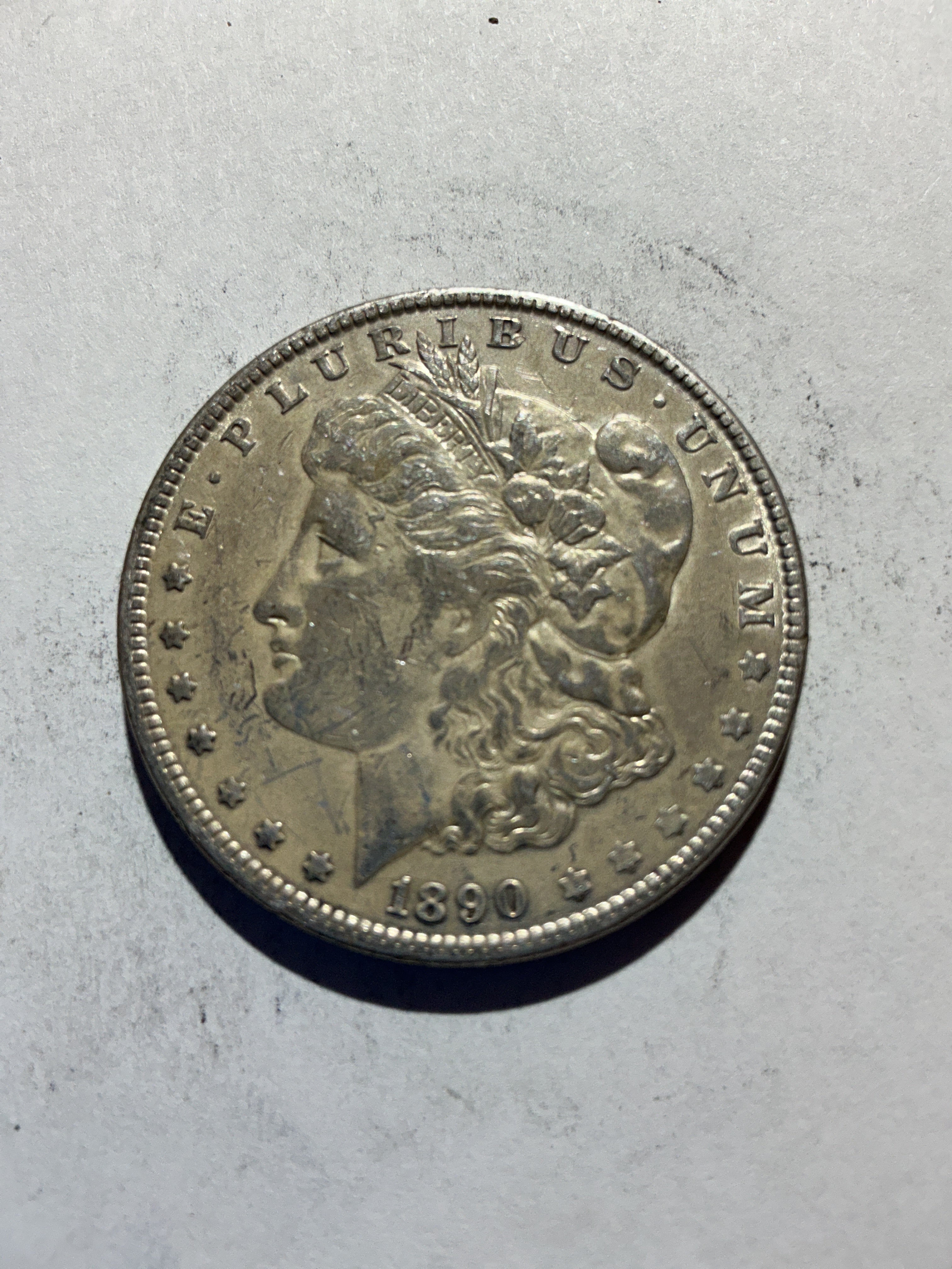 Lot 74, 1890 Morgan silver dollar, xf