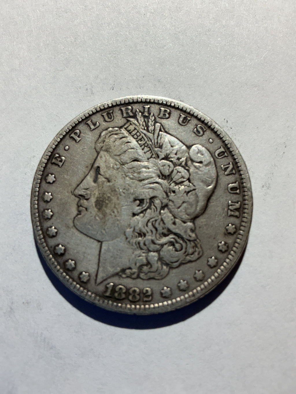 Lot 33, 1882 Morgan silver dollar, f