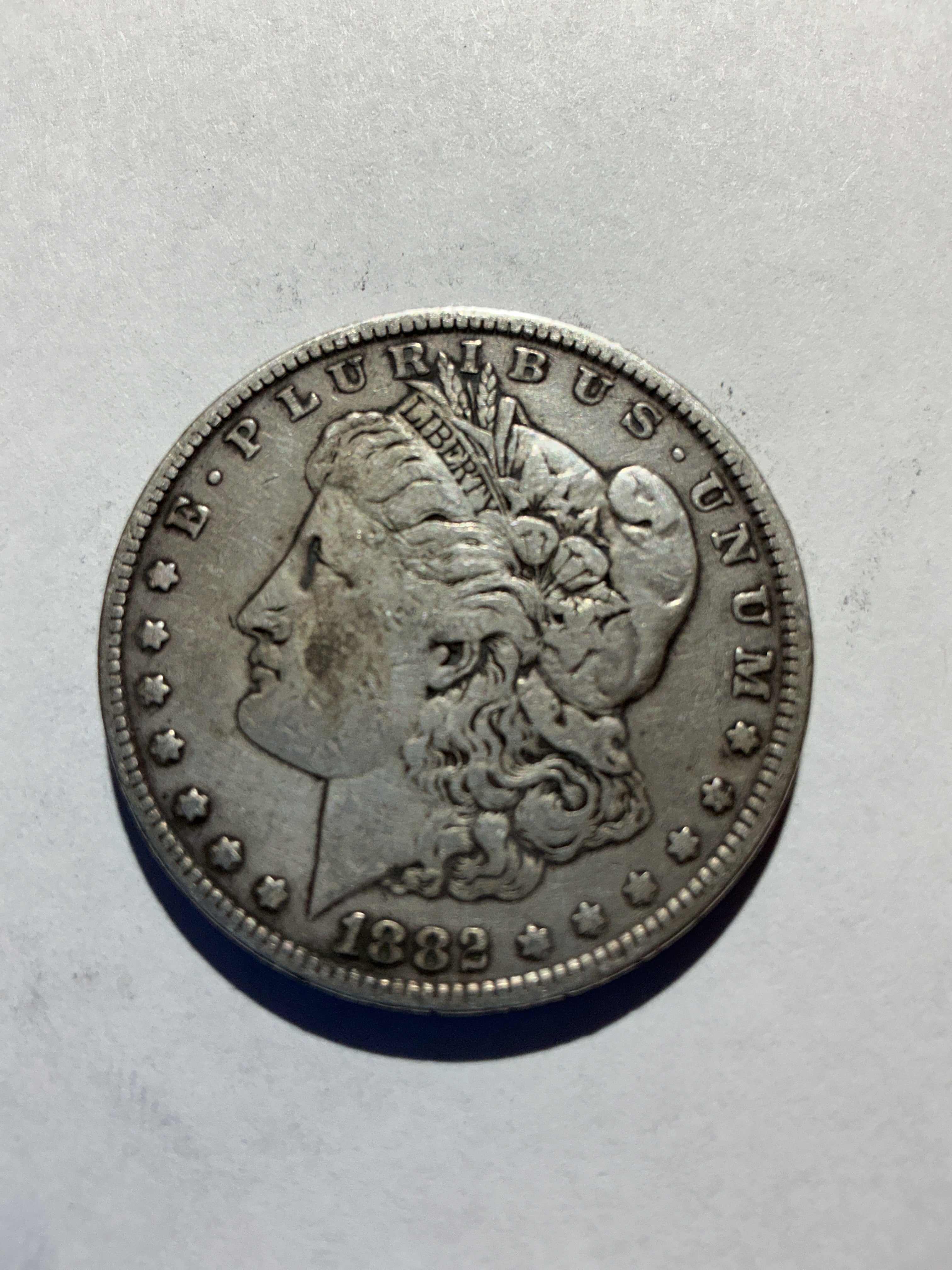 Lot 33, 1882 Morgan silver dollar, f