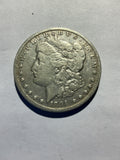 Lot 15, 1891 CC Morgan silver dollar, F