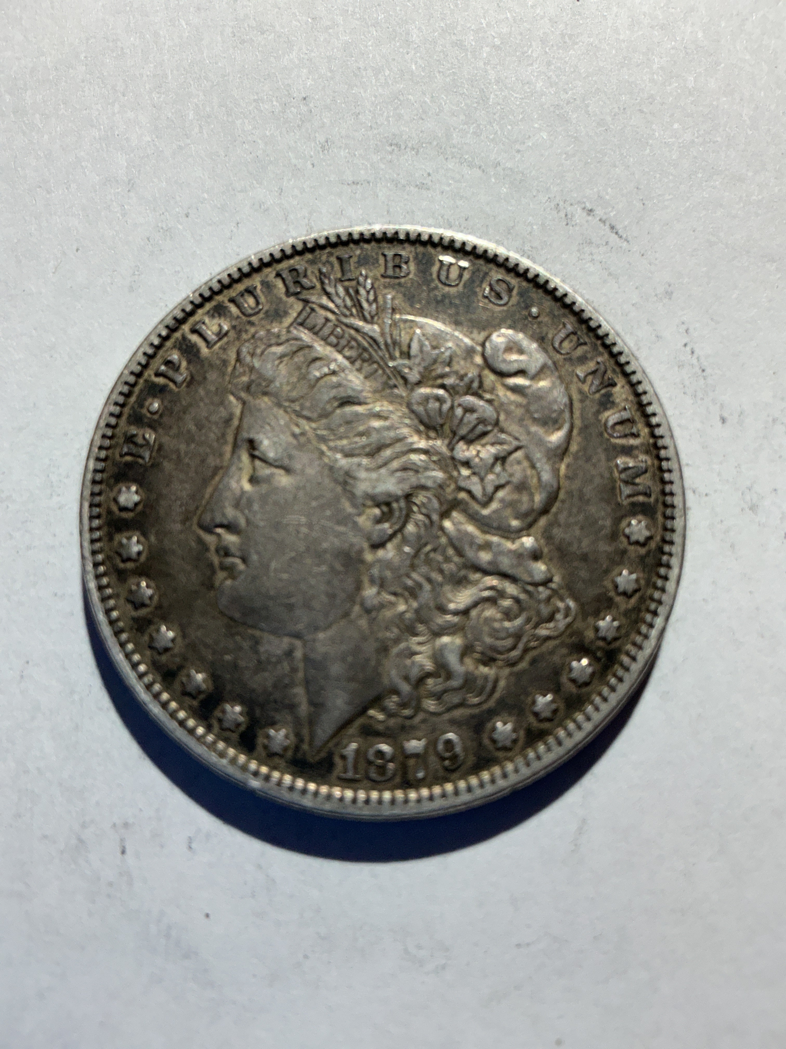 Lot 51, 1879 Morgan silver dollar, xf