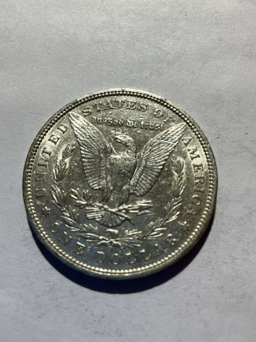 Lot 61, 1900 O Morgan silver dollar, AU