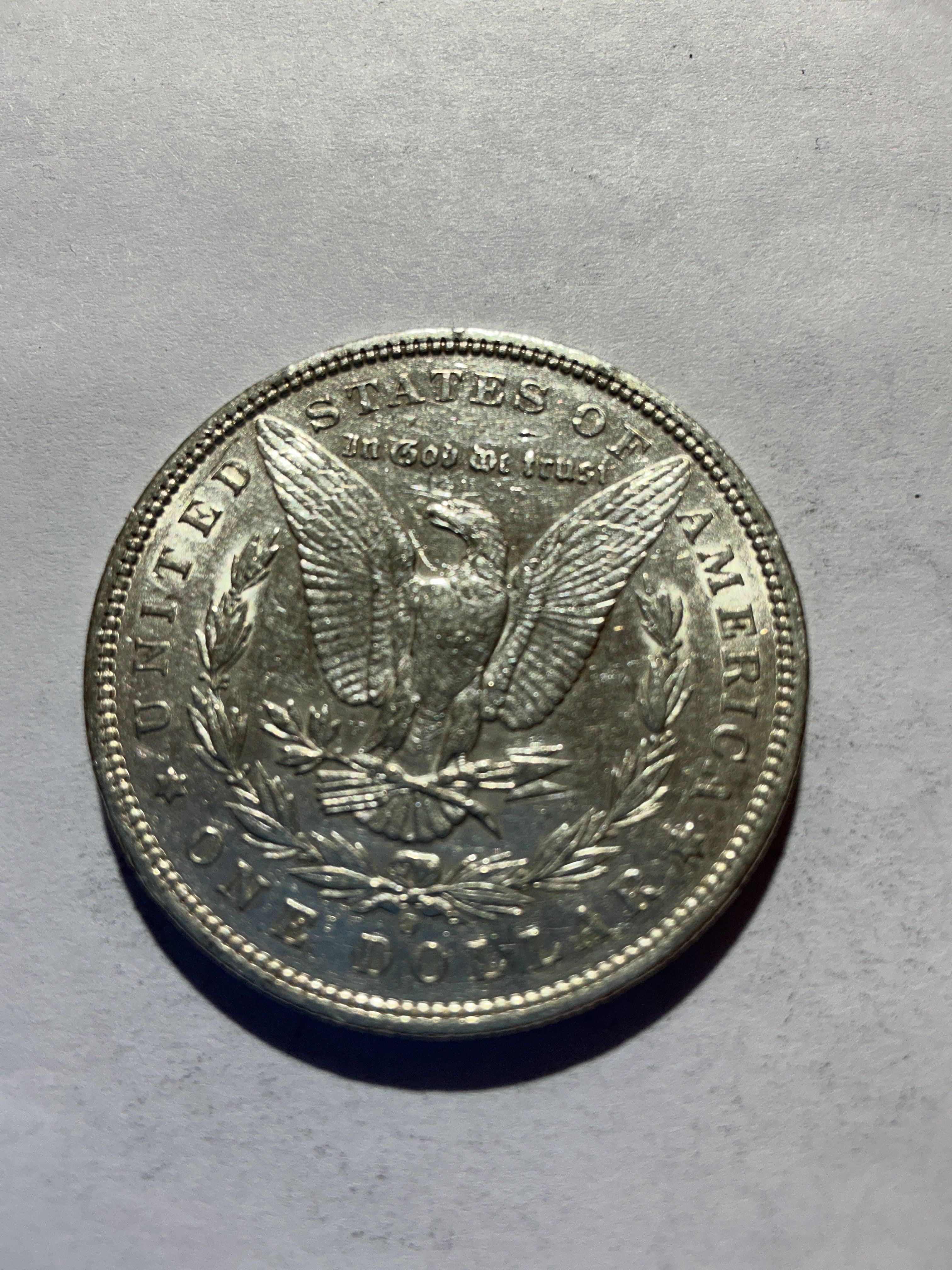 Lot 61, 1900 O Morgan silver dollar, AU