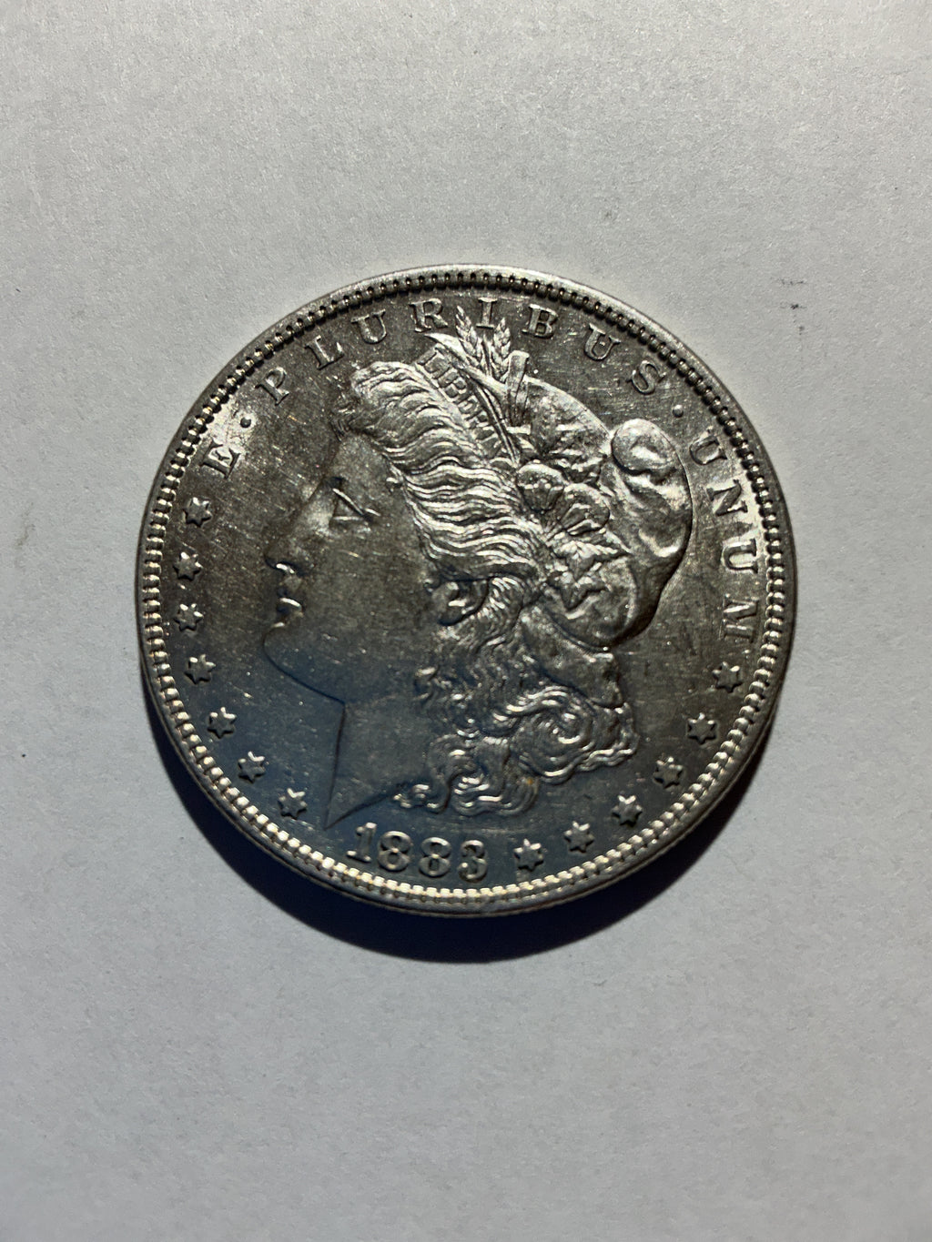 Lot 21, 1883 Morgan silver dollar, AU nice coin