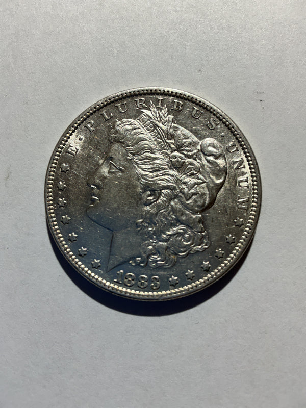 Lot 21, 1883 Morgan silver dollar, AU nice coin