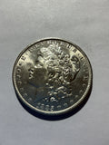 Lot 71, 1885 O Morgan silver dollar, BU