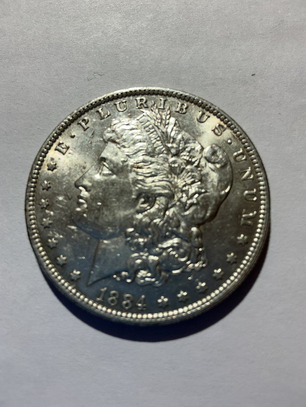Lot 69, 1884 O Morgan silver dollar, BU