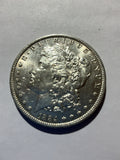 Lot 69, 1884 O Morgan silver dollar, BU
