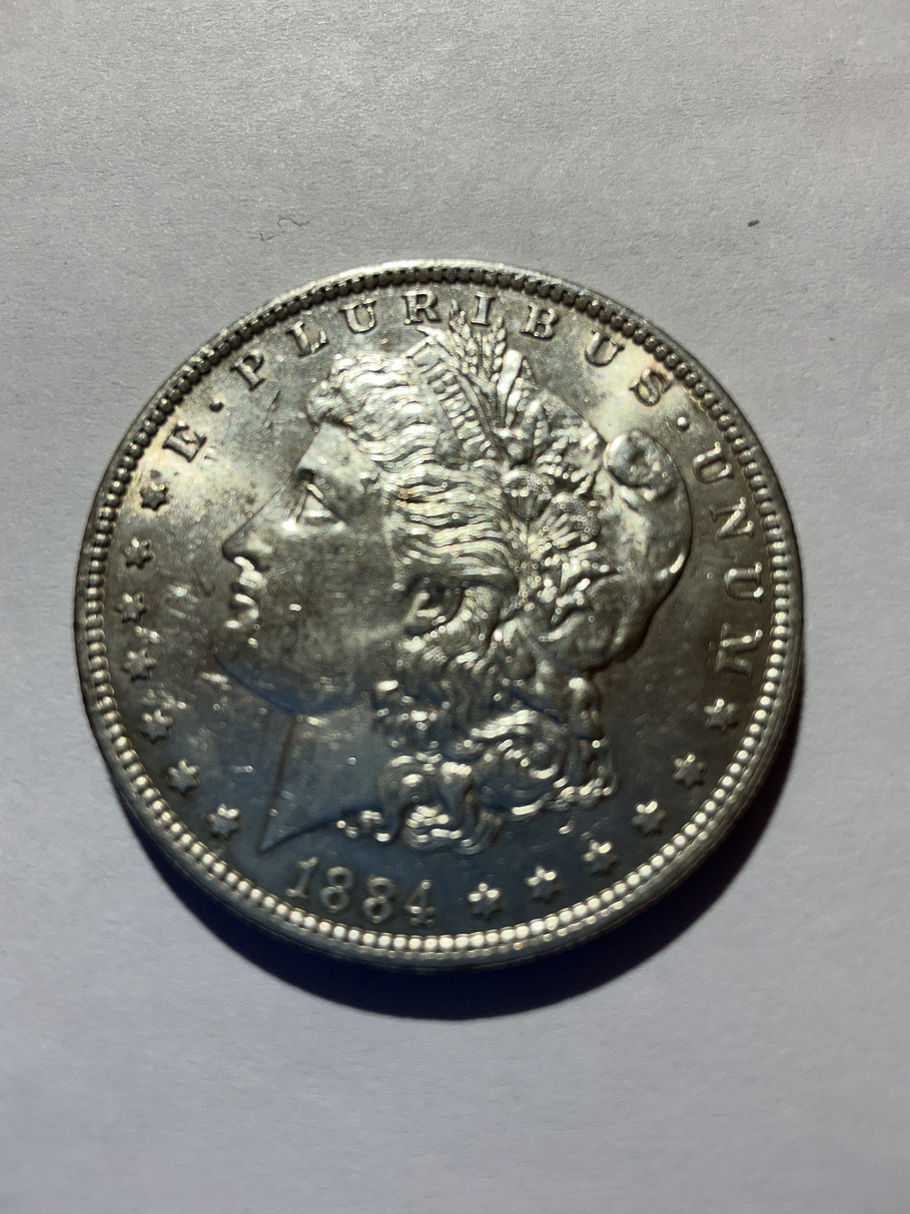 Lot 69, 1884 O Morgan silver dollar, BU