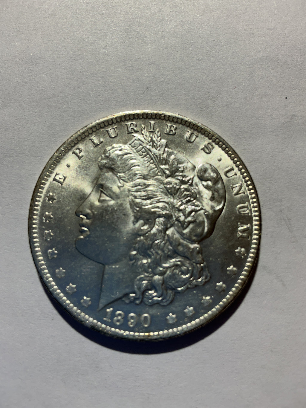 Lot 75, 1890 O Morgan silver dollar, BU