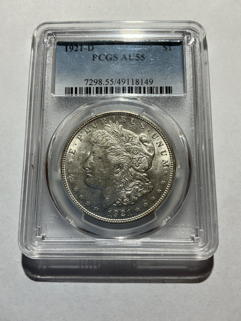 Lot 7, 1921 D Morgan silver dollar, AU55