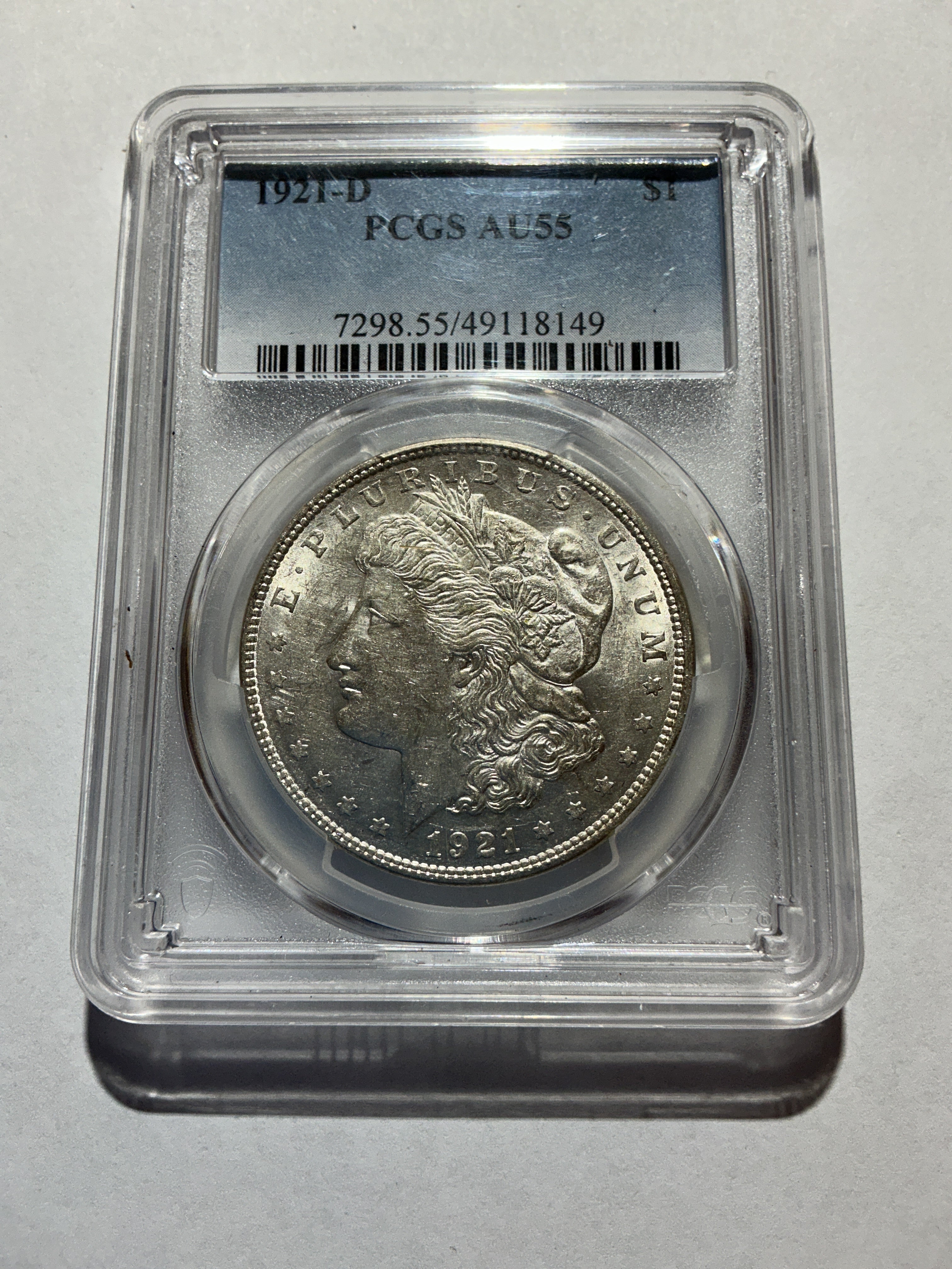 Lot 7, 1921 D Morgan silver dollar, AU55