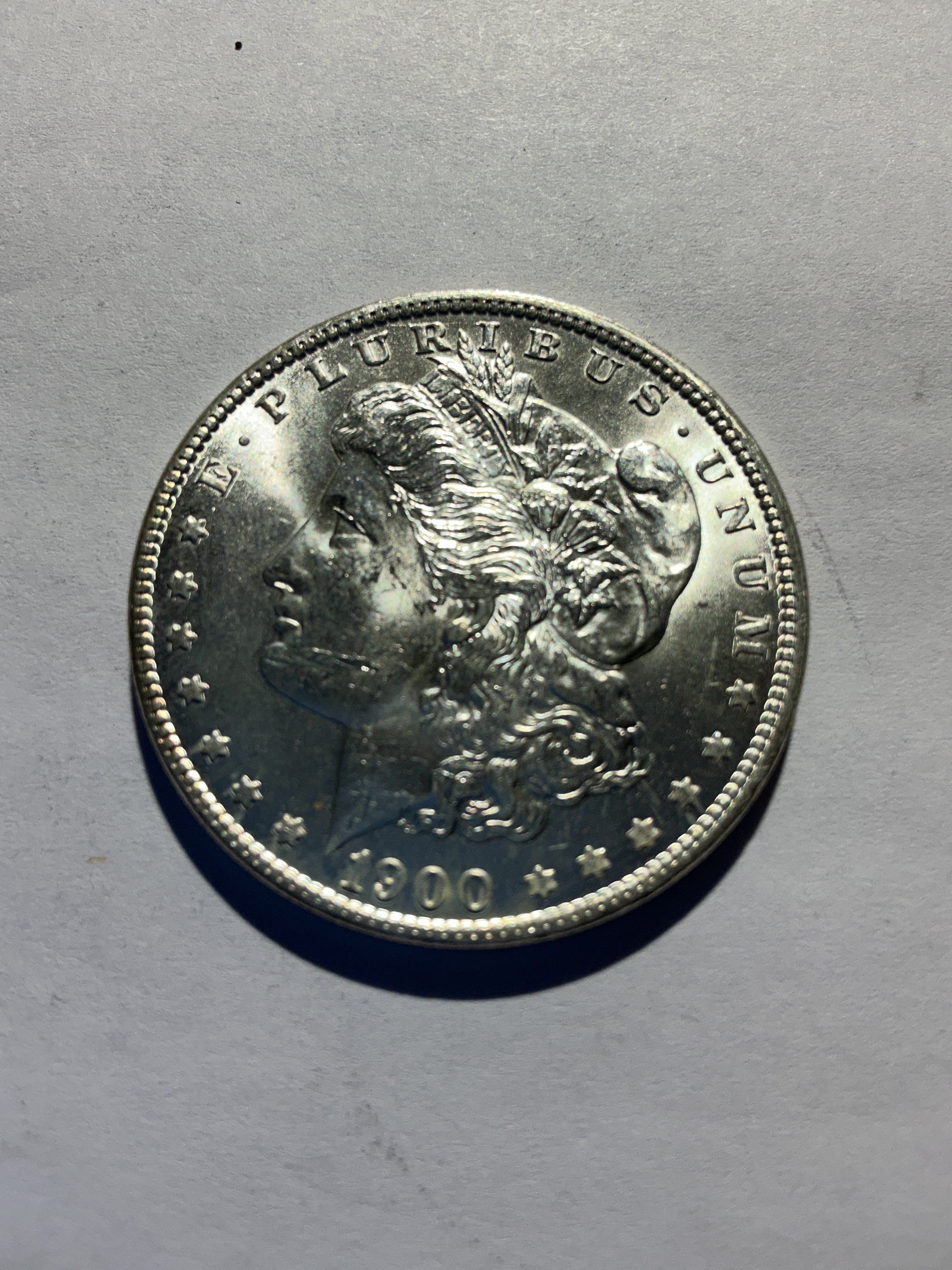 Lot 35, 1900 O Morgan silver dollar, BU